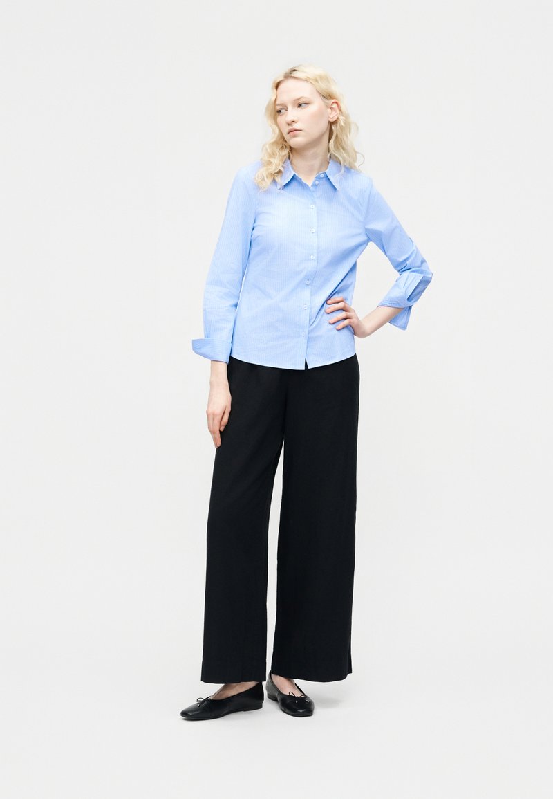 light blue dress shirt with black pants Pocket T-Shirt Slim in Sky Blue main image 0