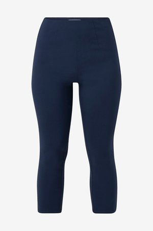 Marineblå tights lavet af glat, strækbart stof; har en høj talje og en cropped design med side sømme for en skræddersyet pasform.