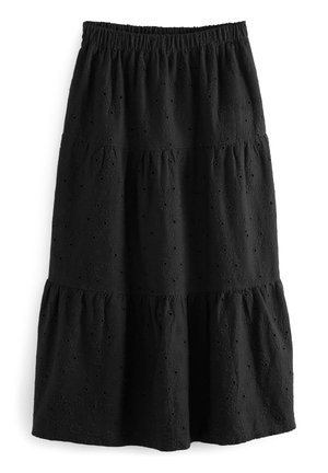 Schwarzer, gestufter Rock aus strukturiertem Stoff mit floralen Lochmuster-Details. Gummibund für zusätzlichen Komfort. Einfaches, fließendes Design.