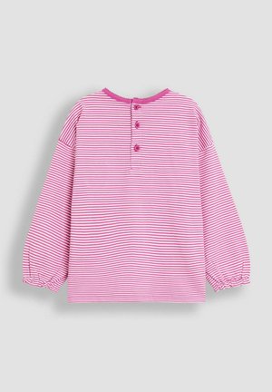 Camicia a maniche lunghe a righe rosa e bianche con polsini elastici, tre bottoni sul retro e rifinitura scallop sul collo.