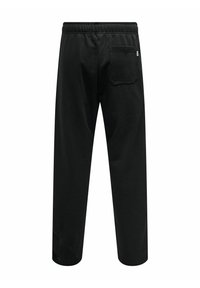 Sorte sweatpants med en afslappet pasform, elastisk talje og en enkelt baglomme. Fremstillet af blødt stof med en glat tekstur.