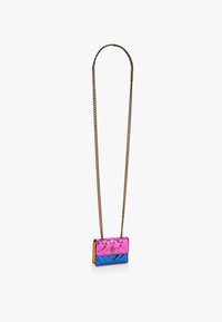 Quilted mini handbag in pink and blue with a gold chain strap, featuring a heart-shaped accent. Textured surface with contrasting colors.