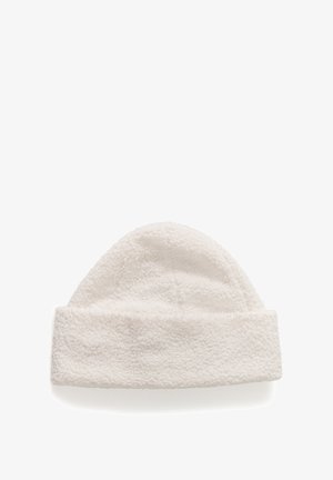 White fleece beanie with a soft texture, rounded crown, and folded cuff for added warmth. Simple, unadorned design.