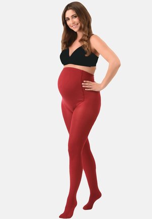Collant premaman rossi realizzati in un tessuto morbido e elasticizzato. Design a vita alta che si adatta a una pancia in crescita. Texture liscia e completa copertura della gamba.