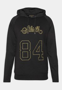 Felpa nera con cappuccio caratterizzata da un grande logo dorato "Siksilk" e il numero "84" sul davanti. Progettata con cappuccio regolabile e maniche lunghe.
