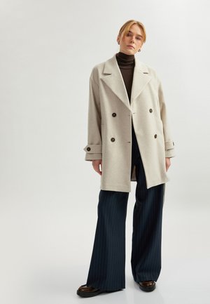 BELTED - Trenchcoat - beige