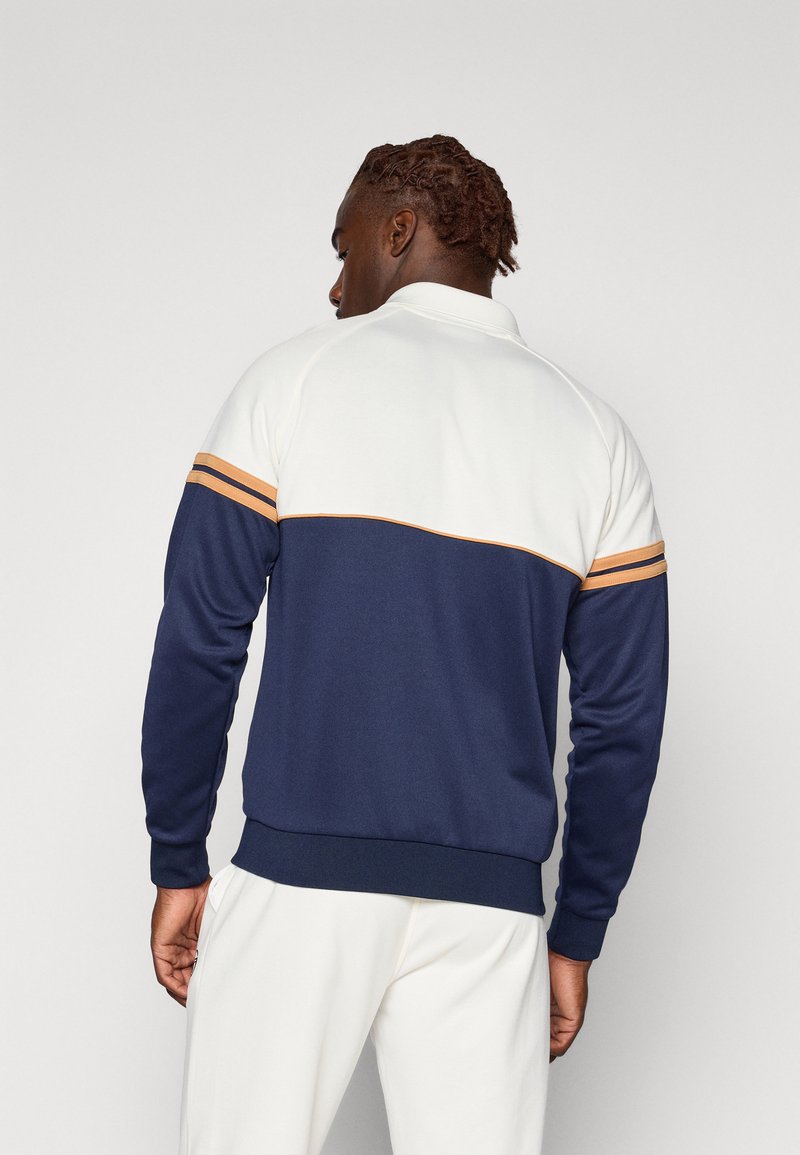 Veste de Survêtement Sergio Tacchini Prannie 024 40846 366 Gardenia Veste de Survêtement Sergio Tacchini Prannie 024 40846 366 Gardenia