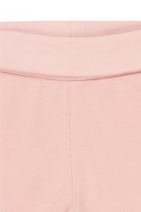 Lichtroze sweatpants met een zachte structuur, elastische tailleband en gestikte naden, die een eenvoudige en ontspannen uitstraling benadrukken.