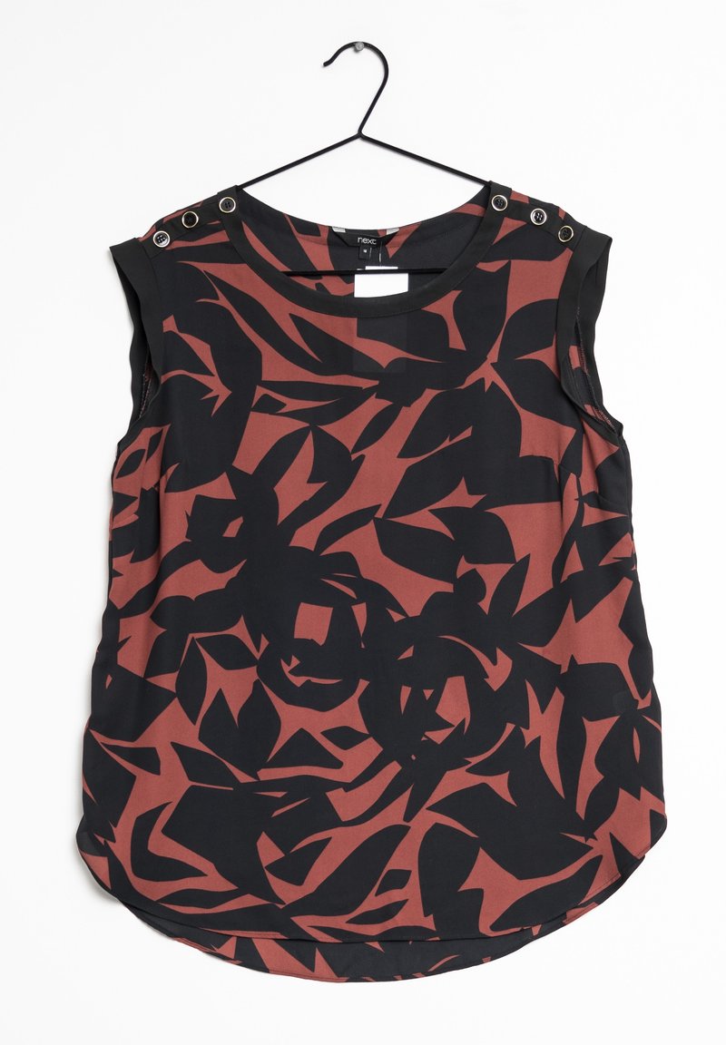 Haut sans manches à motifs floraux rouge et noir, avec un col rond et des boutons décoratifs aux épaules, fabriqué en tissu lisse et léger.