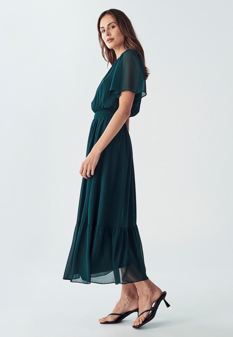 slim fit dress slacks A Line Sweetheart Neck Open Back Dark Green Tulle Long Prom Dress with –  abcprom main image 1