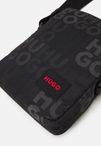 HUGO ETHON ZIP UNSEX - Cross body bag - black