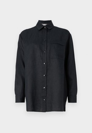 Black linen long-sleeve shirt with a button-down collar, front button placket, single chest pocket, and relaxed fit.
