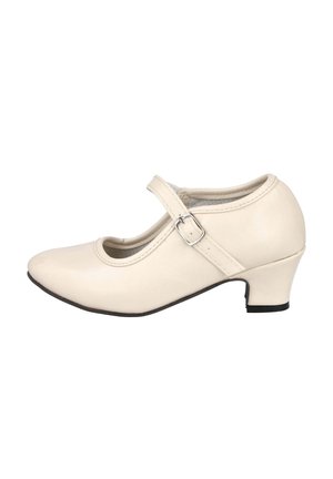 Zapato Mary Jane color crema con un tacón bajo curvado y una correa con hebilla plateada sobre el empeine, mostrado de perfil lateral.