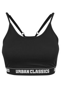 Crni sportski grudnjak s podesivim naramenicama, trakom s logotipom koja glasi "URBAN CLASSICS", glatka tkanina i prilagođen dizajn za udobnost i potporu.