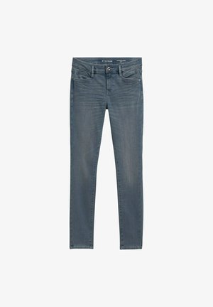 Jean skinny en denim bleu moyen délavé, comprenant cinq poches, une fermeture éclair avec un bouton, et de légers effets d'usure sur le devant.