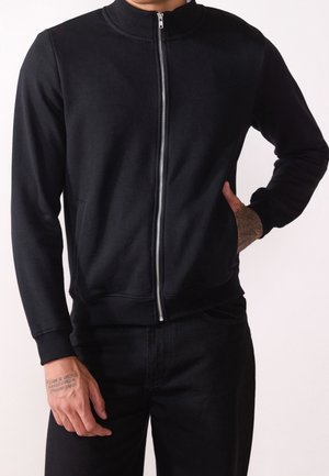 Tröja med dragkedja - black