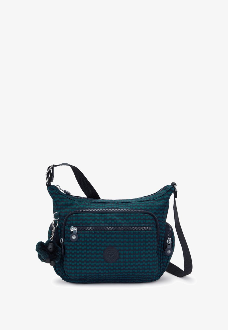 Borsa a spalla in tessuto blu scuro con motivo geometrico, dotata di un ampio scomparto principale con zip, tasca frontale e un charm in pelliccia rimovibile.