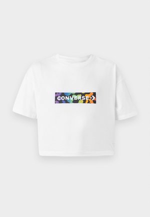 White cropped t-shirt made of cotton featuring a central rectangular graphic with multicolored abstract shapes and the word "CONVERSE."