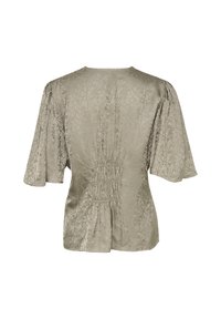 Blusa verde oliva chiaro con un motivo testurizzato, maniche corte a sbuffo e dettagli arricciati sulla schiena per una forma aderente.