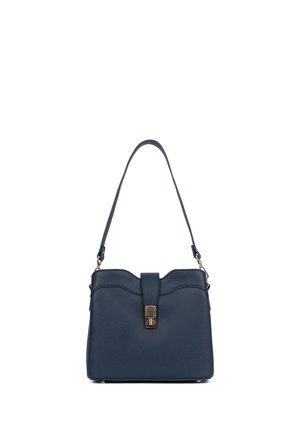 Marineblauwe leren handtas met enkele schouderriem en goudkleurige sluiting, gestructureerde vorm en subtiele textuurafwerking.