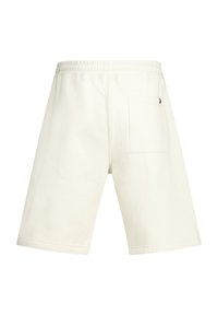 Beige puuvillashortsit, joissa on joustava vyötärö, takatasku ja rento istuvuus, sileä pinta ja polvenpituinen muotoilu.