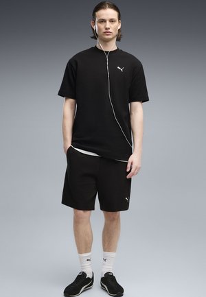 Puma, ESSENTIALS ELEVATED RELAXED T-SHIRT - T-Shirt basic - black
