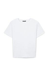 T-shirt bianco in cotone, maniche corte, scollo rotondo, vestibilità ampia, colore uniforme, senza motivi o decorazioni, texture liscia.