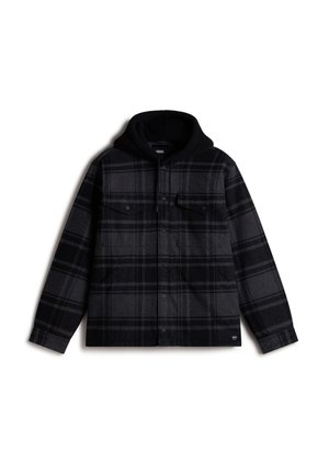 Veste en flanelle à carreaux noirs et gris avec une capuche doublée en polaire noire, deux poches avant et des fermetures à bouton. Texture douce, design décontracté.