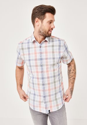 Short-sleeve, plaid shirt featuring red, blue, and green check patterns on a white background, button-up front with a pointed collar.