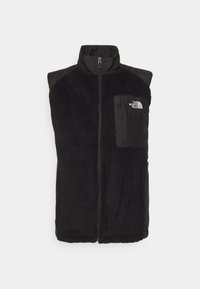 Veste sans manches en polaire noire avec fermeture éclair intégrale à l’avant et petite poche poitrine marquée à gauche.