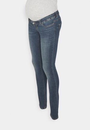 Jeans skinny premaman in denim scuro, con un design aderente, vita elastica per il massimo comfort e il classico stile a cinque tasche.