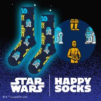 Námornícke ponožky so vzorom R2-D2 a C-3PO v modrej a žltej farbe. Vyrobené z jemného materiálu s hravým, opakujúcim sa grafickým dizajnom.