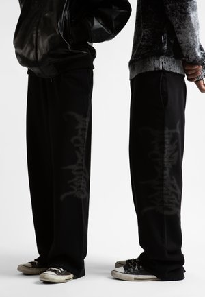 NETHER UNISEX - Pantalon de survêtement - black