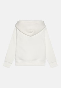 White hoodie with a soft texture, a kangaroo pocket, and a drawstring hood. Features ribbed cuffs and hem for a snug fit.