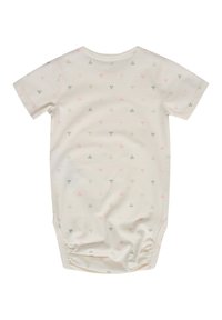 Kortärmad jumpsuit i lätt, krämfärgad bomull med ett upprepat mönster av små blommotyger i rosa, grönt och svart. Knäppningar i botten.