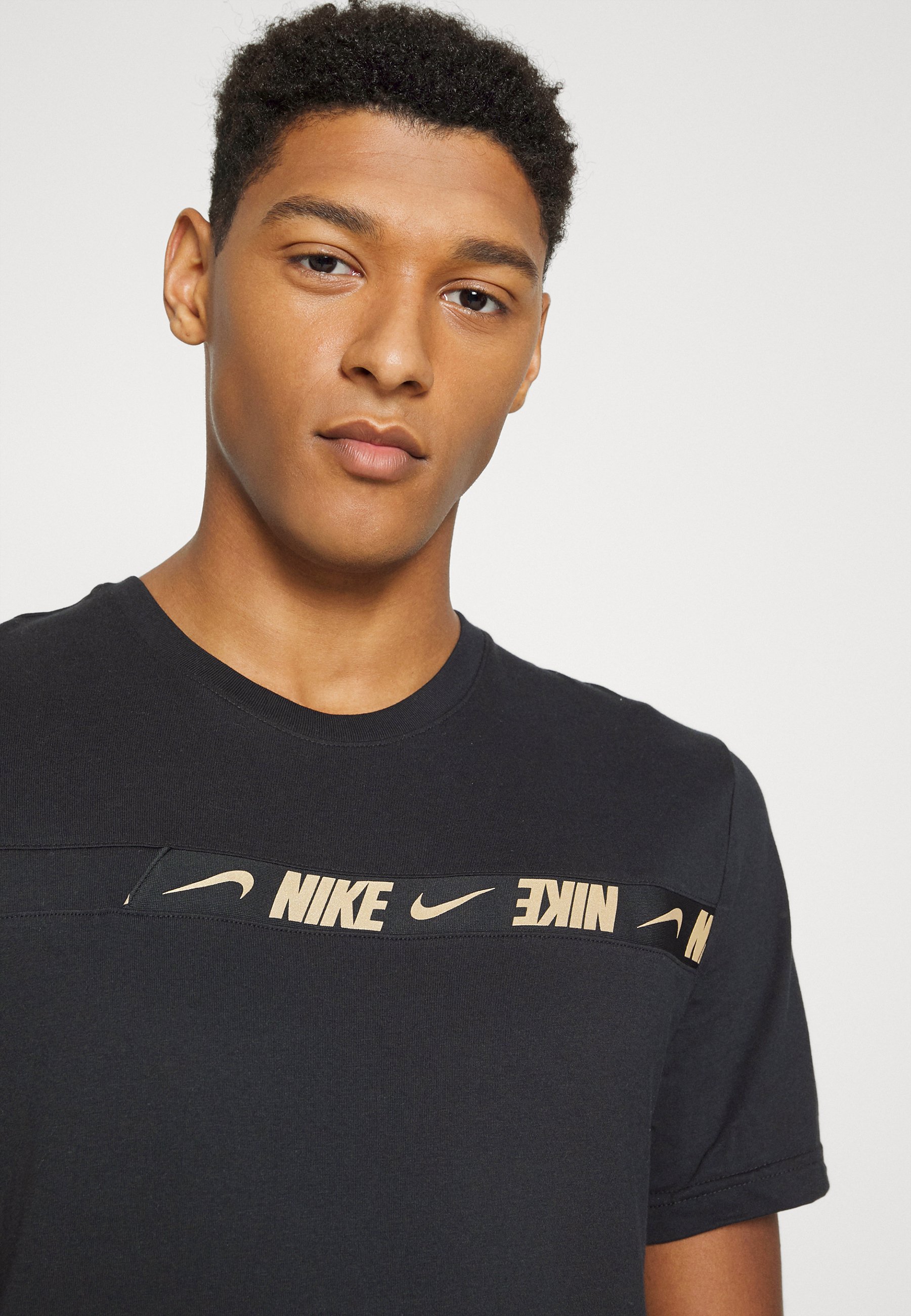 Nike gold and black shirt Clearance