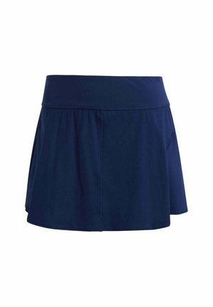 Skort activo azul marino con una amplia cinturilla elástica, silueta acampanada y tejido texturizado, con un detalle discreto de bolsillo lateral.
