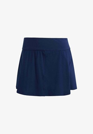 Skort activo azul marino con una amplia cinturilla elástica, silueta acampanada y tejido texturizado, con un detalle discreto de bolsillo lateral.