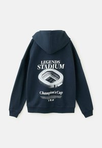 Navy hoodie featuring a graphic of a stadium on the back, with "LEGENDS STADIUM" and "Champion's Cup" text in white. Soft fabric, casual fit.