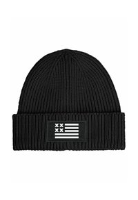 Black knit beanie with ribbed texture and a folded cuff. Features a rectangular patch displaying a flag design in white and black.