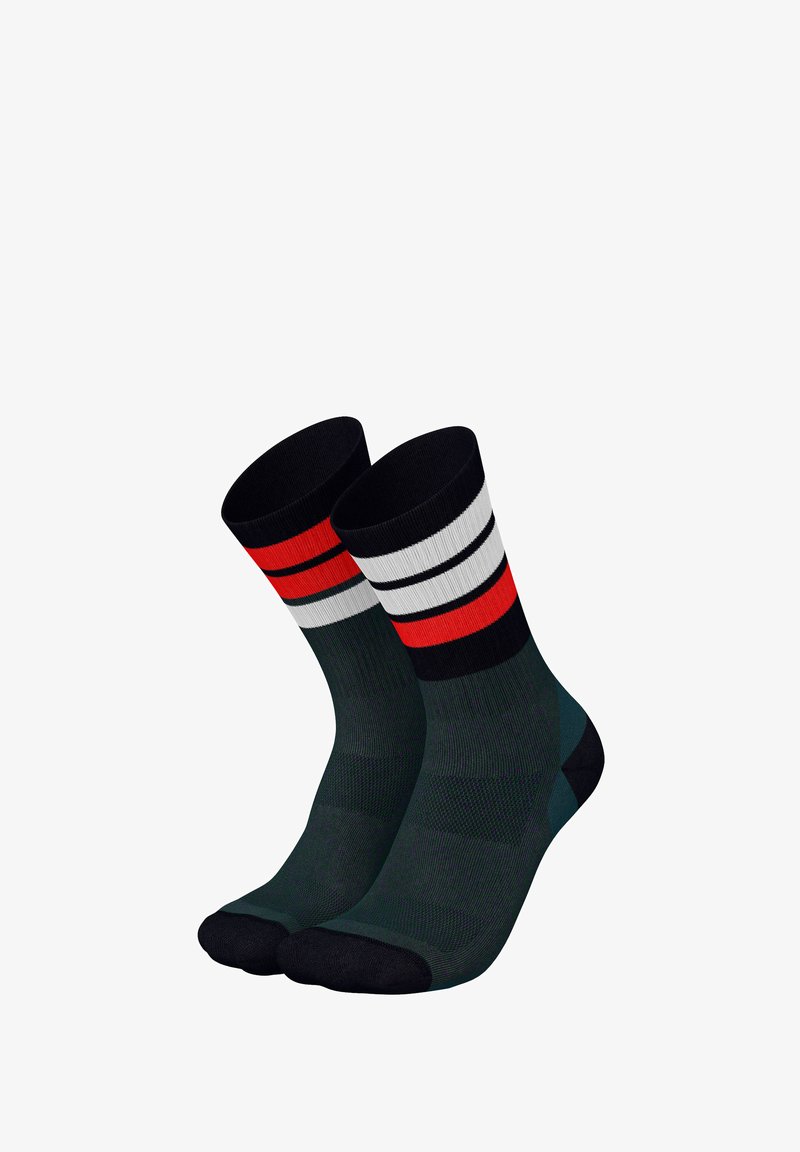 Dark green socks with black and white stripes at the top, accented by red. Ribbed texture with a reinforced heel and toe.
