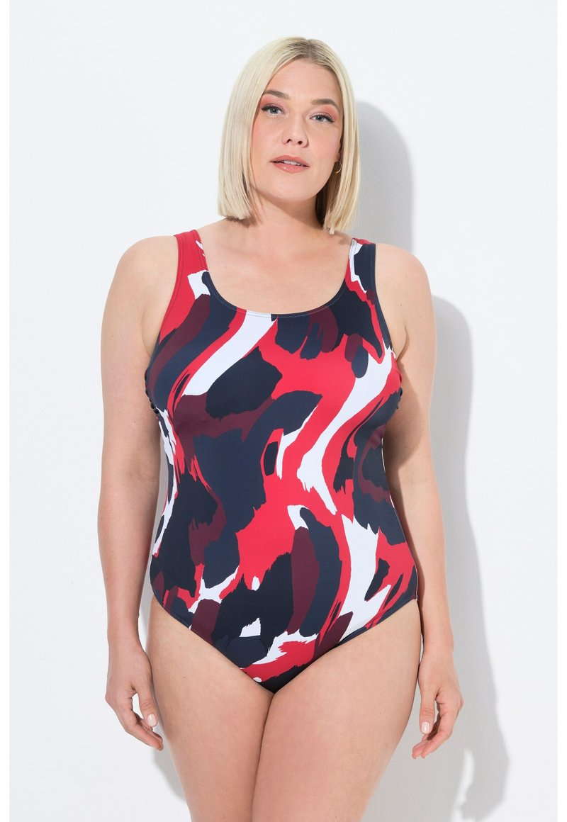 Uimapuku, jossa on punainen, laivastonsininen ja valkoinen abstrakti kuvio. Valmistettu joustavasta materiaalista, pyöreällä kaula-aukolla ja leveillä olkaimilla.