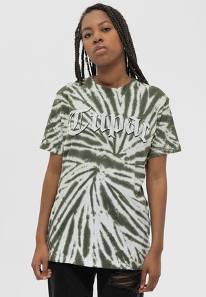 Green and white tie-dye t-shirt featuring the word "Tupac" in bold white lettering. Short sleeves and a relaxed fit.