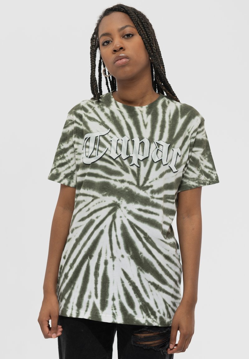 Green and white tie-dye t-shirt featuring the word "Tupac" in bold white lettering. Short sleeves and a relaxed fit.