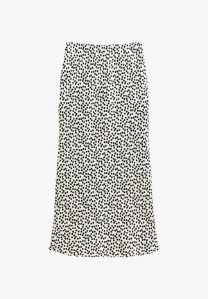 Gonna midi a pois bianca e nera con un design aderente, texture liscia e leggero svaso all'orlo.