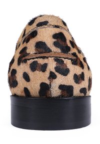 Leopardmønster plattform sko med faux pels tekstur, avrundet form og en kraftig svart såle. Synlige søm detaljer forbedrer designet.