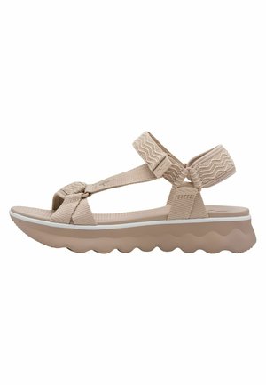 Beige sandal med elastiske remme og zigzag-detaljer. Har en polstret, bølget gummisål. Letvægtsdesign, der egner sig til hverdagsbrug.