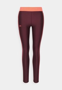 Ciemnofioletowe legginsy sportowe z koralowym pasem i lamówką, z małym logo Under Armour na lewej udzie.