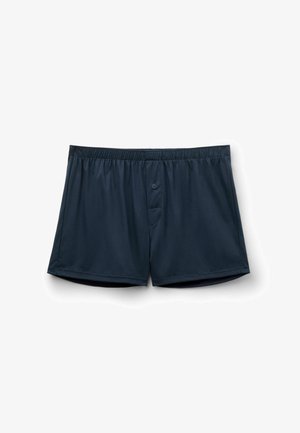 Námořnické modré bavlněné boxerky s elastickým pasem, jedním knoflíkem na rozkroku a malou kapsičkou na přední straně pro pohodlí.