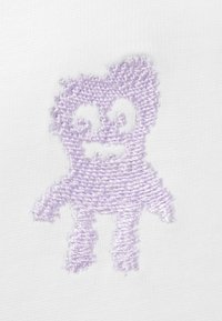 Embroidered character in light purple on a white fabric background, featuring a round head, large eyes, and a playful stance.